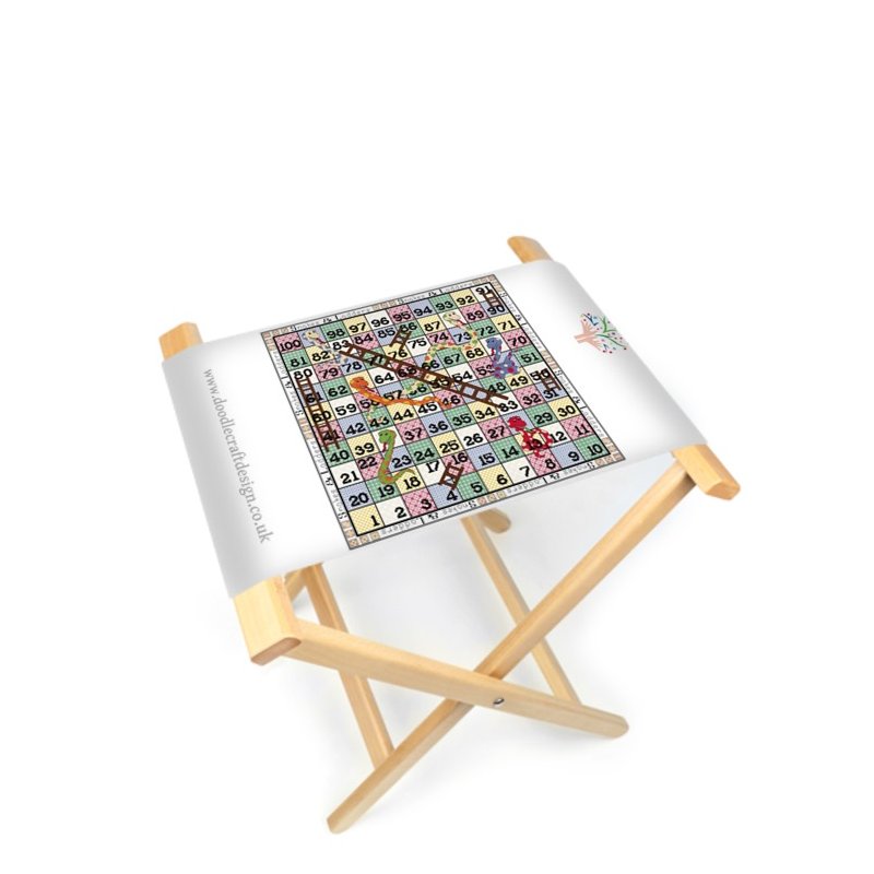 The DoodleCraft Design Snakes and Ladders games board printed onto canvas and made into a foldable board and stool