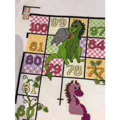 DoodleCraft Design's version of Snakes & Ladders, this is the Dragons & Beanstalks kit created in counted cross stitch and blackwork